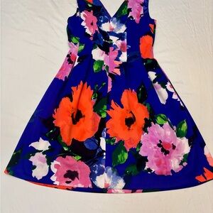 Vince Camuto Woman’s Dress with Bold Floral Print. Size 10.